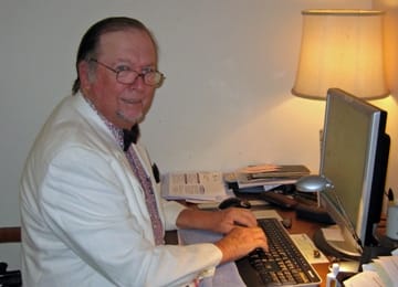 Hans working at his computer